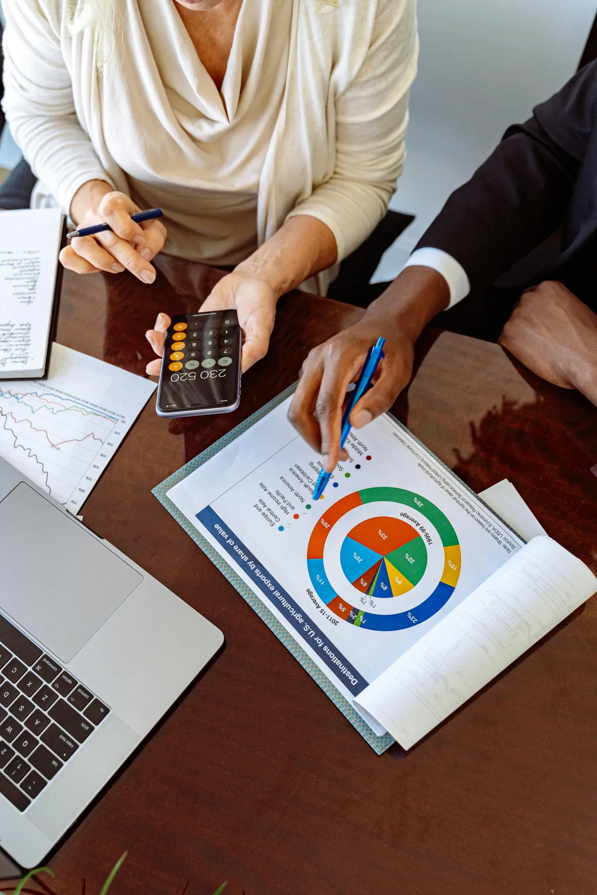 Mortgage professionals collaborating on home loan documents